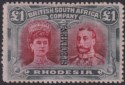 Click for more photos and details Rhodesia 1910 KGV SPECIMEN Double Head £1 Crims + Sl-Blk Mint SG166as Extra Curl